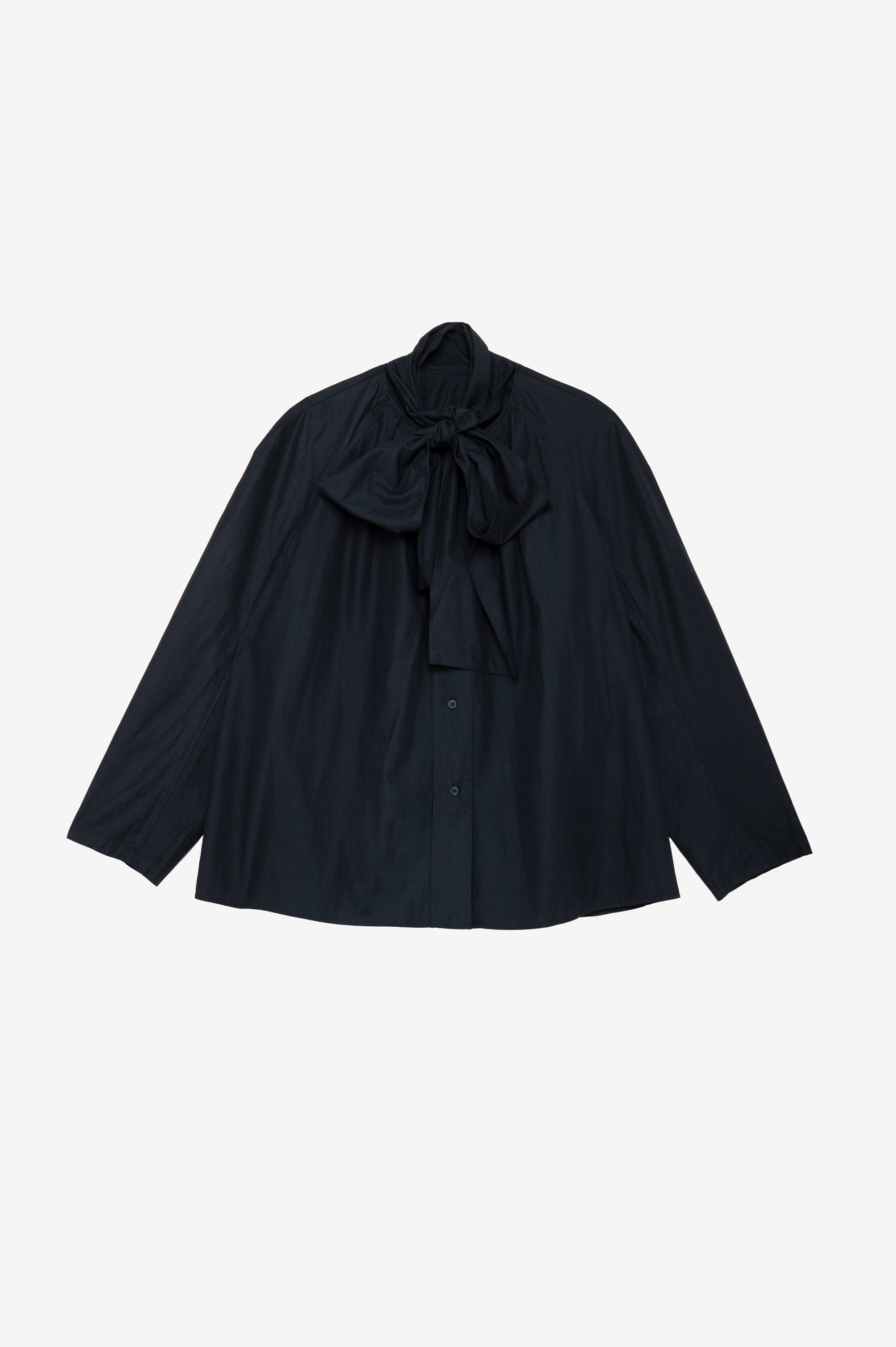 Dark blue blouse with a large bow 