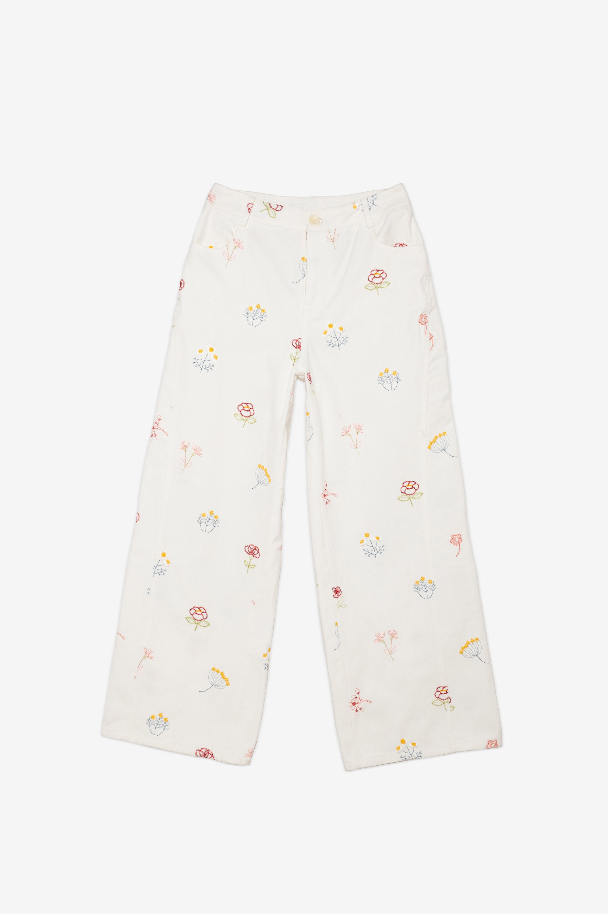 White pants with colorful floral pattern 